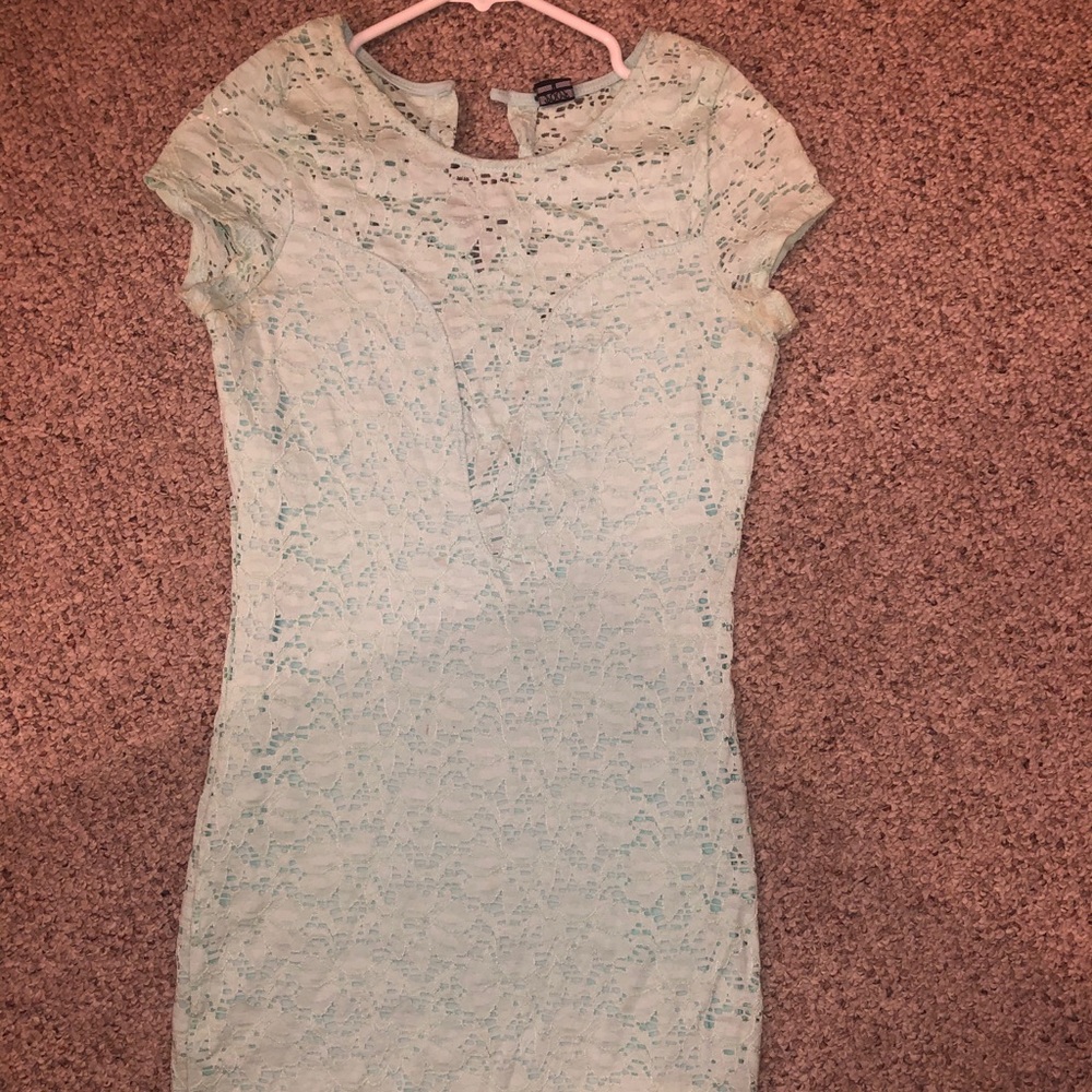 Tight light blue lace dress